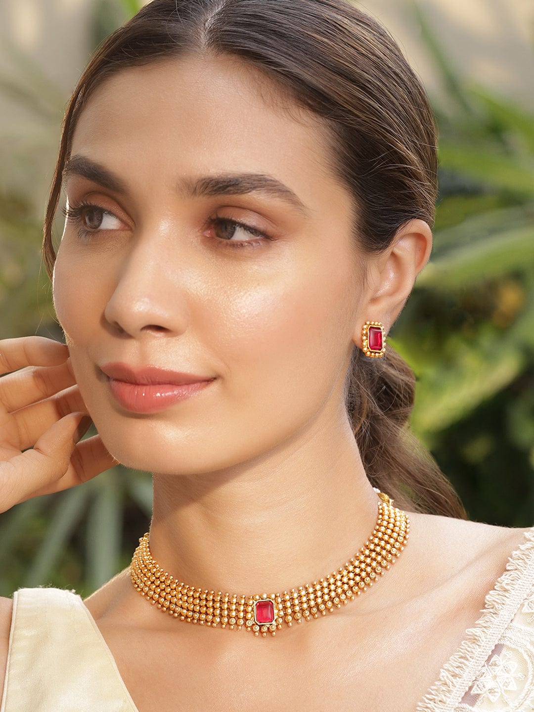 Gold Plated Brass Ruby Stone Studded Intricate Necklace With Earrings Set