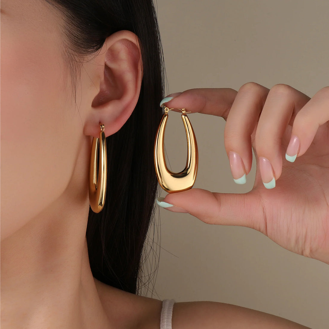 Extended Oval Gold Earring